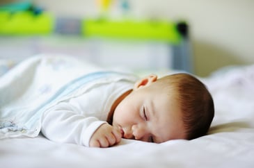Teaching Babies to Roll from Belly to Back: Sleep Solutions During Motor Milestones