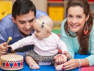 starfish_therapies_pediatric_physical_therapists-parents-playing-six-months-old-baby 2 copy